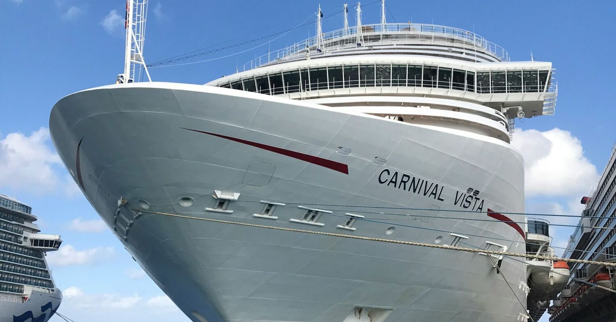 Carnival Vista cruise ship docked at a port