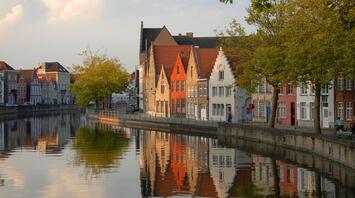 Scenic canal view with traditional buildings in Bruges, Belgium