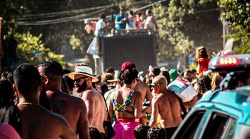 Crowd celebrating Carnaval in Brazil with music and street parties