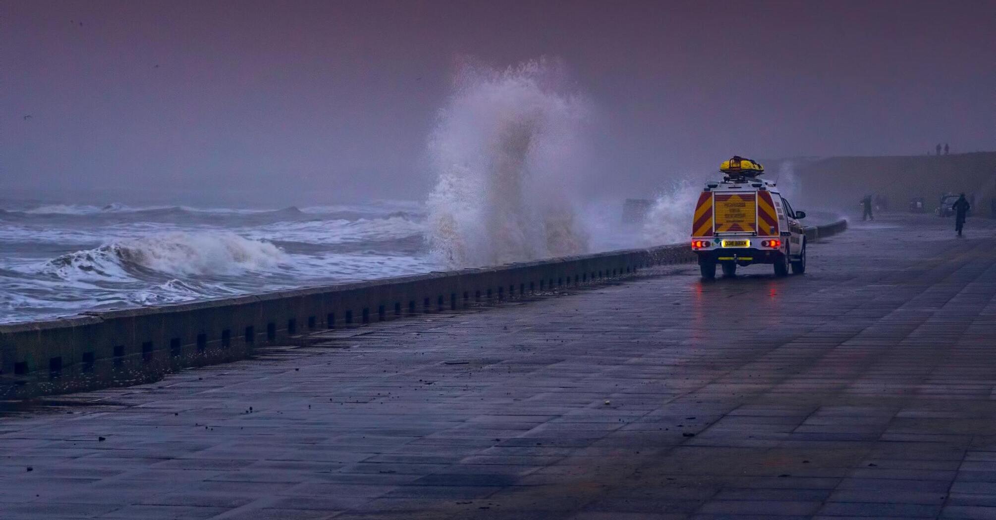 Waves crashing against the seawall