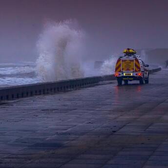 Waves crashing against the seawall