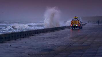Waves crashing against the seawall
