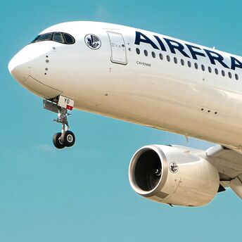 Air France aircraft in flight against a clear blue sky