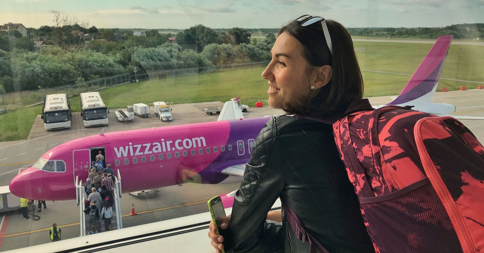 Traveller looking at Wizz Air plane