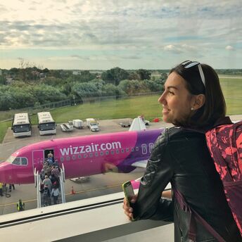Traveller looking at Wizz Air plane