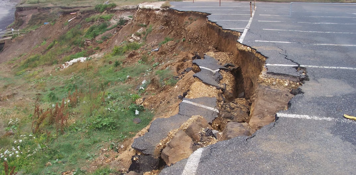 Collapsed road after earthquake damage near the coast