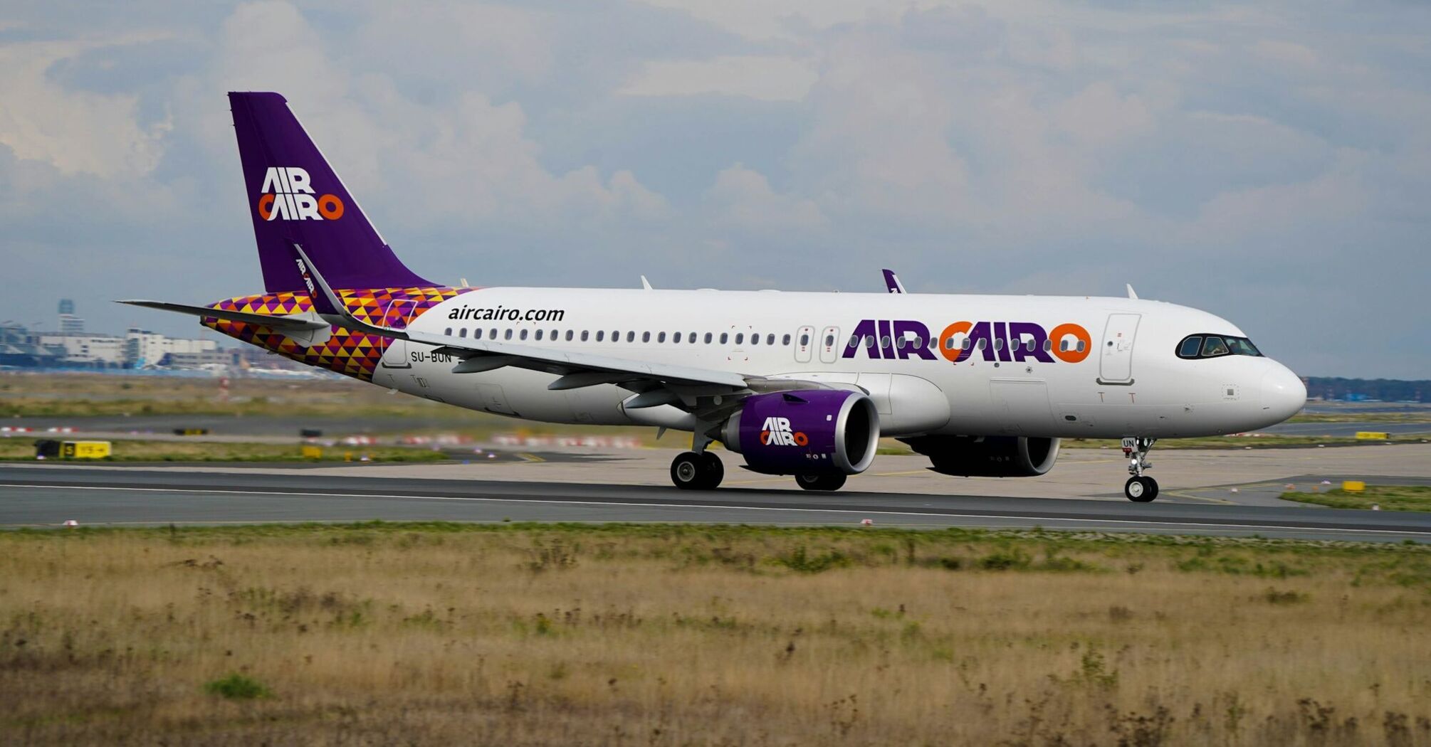 Air Cairo aircraft taxiing on the runway
