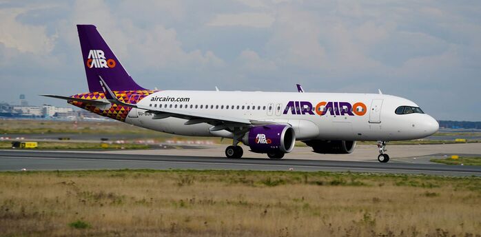 Air Cairo aircraft taxiing on the runway