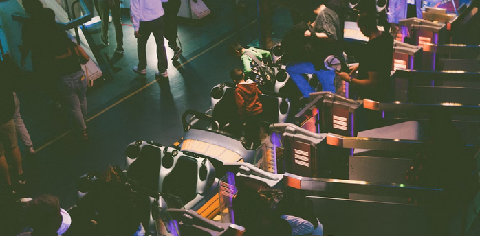 Passengers waiting at an airport check-in area