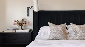 Modern hotel bedroom with elegant decor and neutral tones