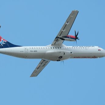 Air Serbia aircraft flying in clear sky