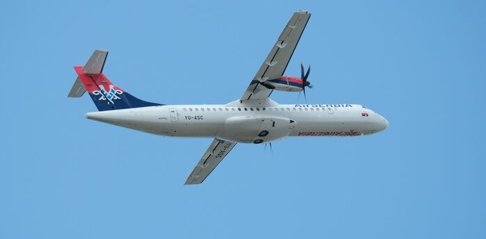 Air Serbia aircraft flying in clear sky