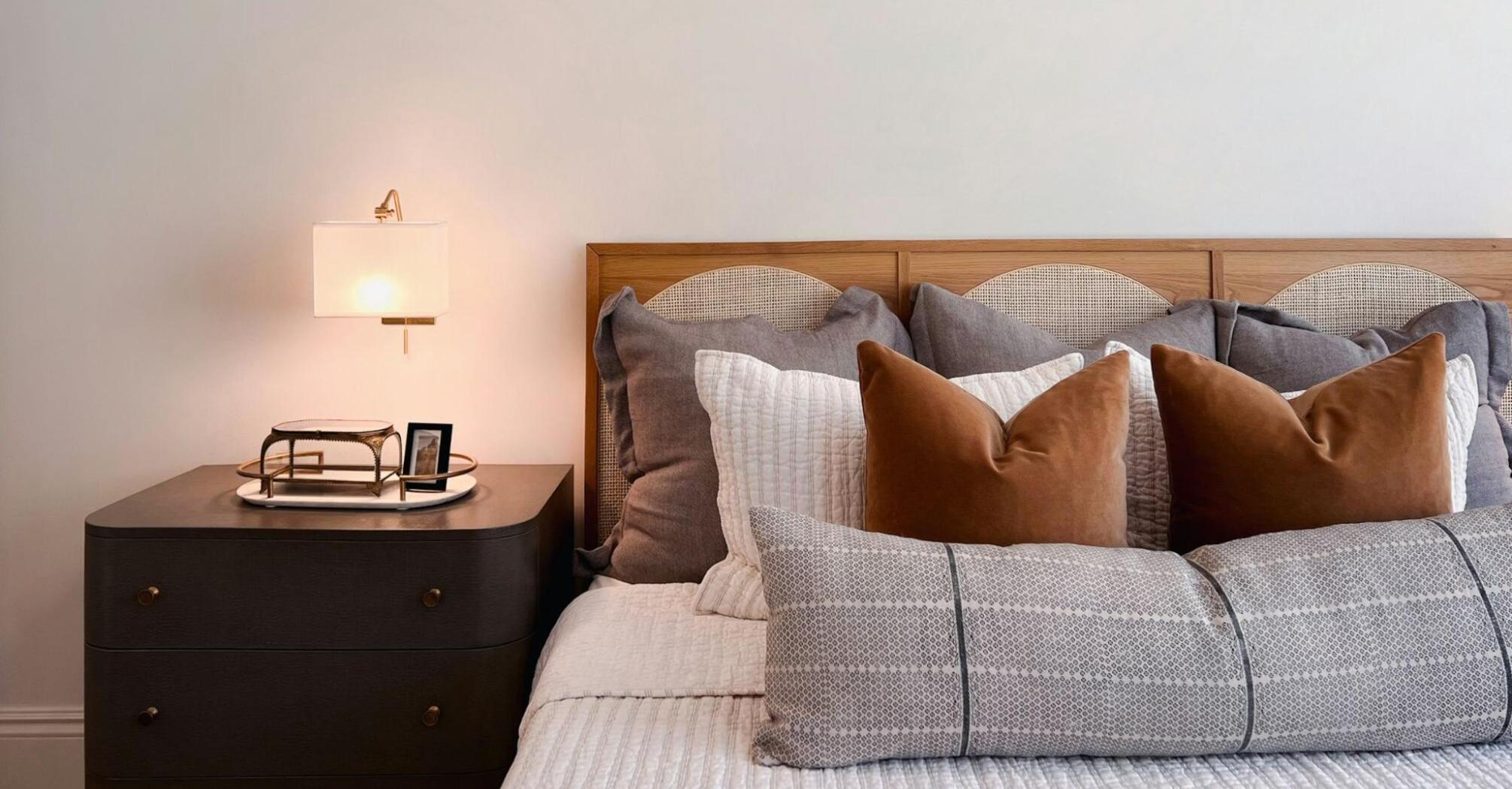 Modern hotel bedroom with minimalist décor and soft lighting