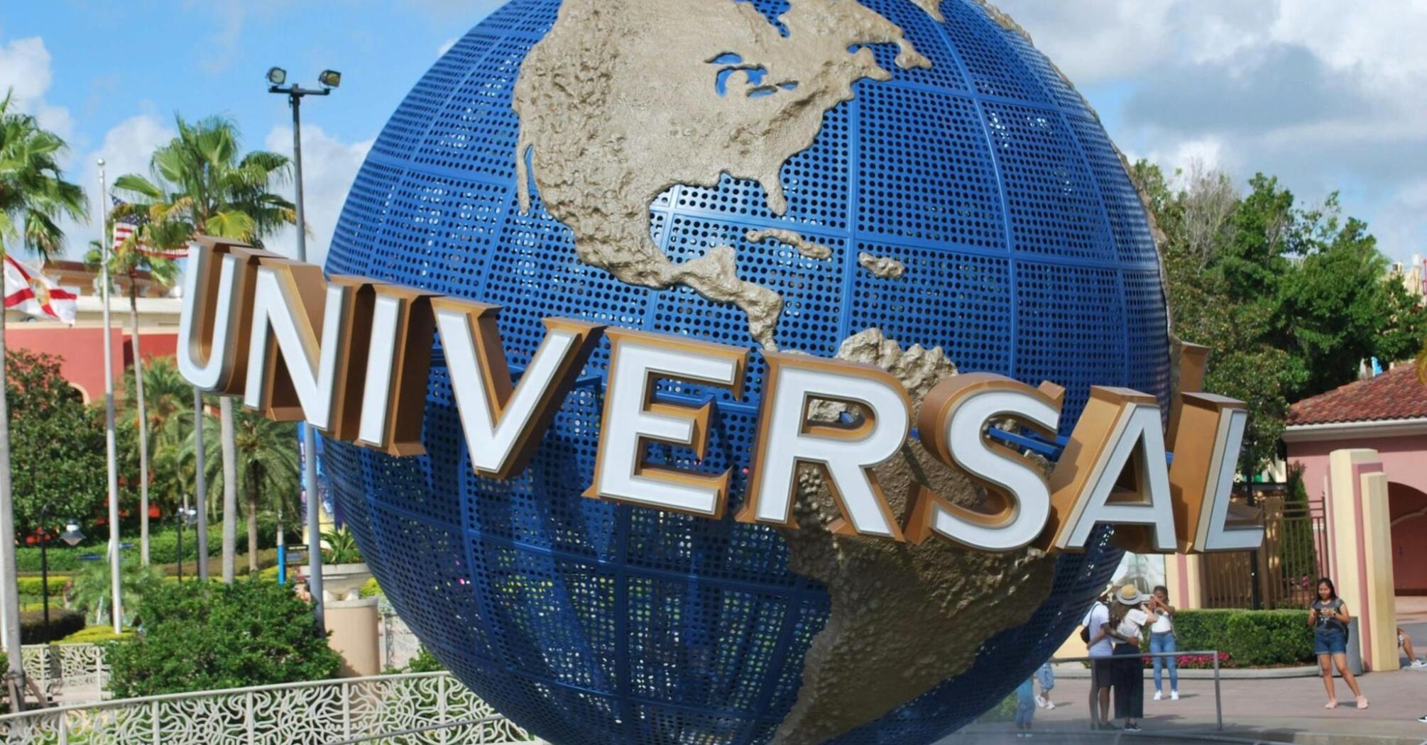 Universal Studios globe monument at a theme park entrance