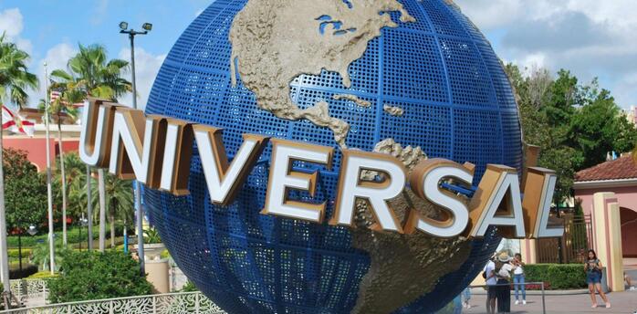 Universal Studios globe monument at a theme park entrance