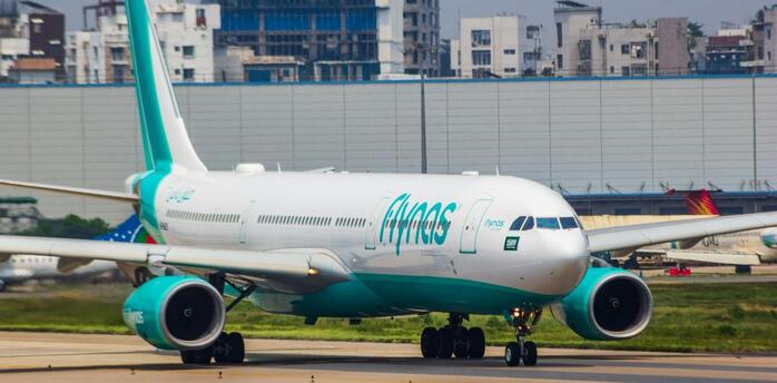 Flynas Airbus A330 taxiing on runway at airport