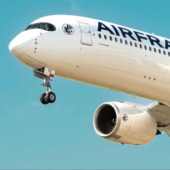 Air France aircraft approaching for landing under clear skies