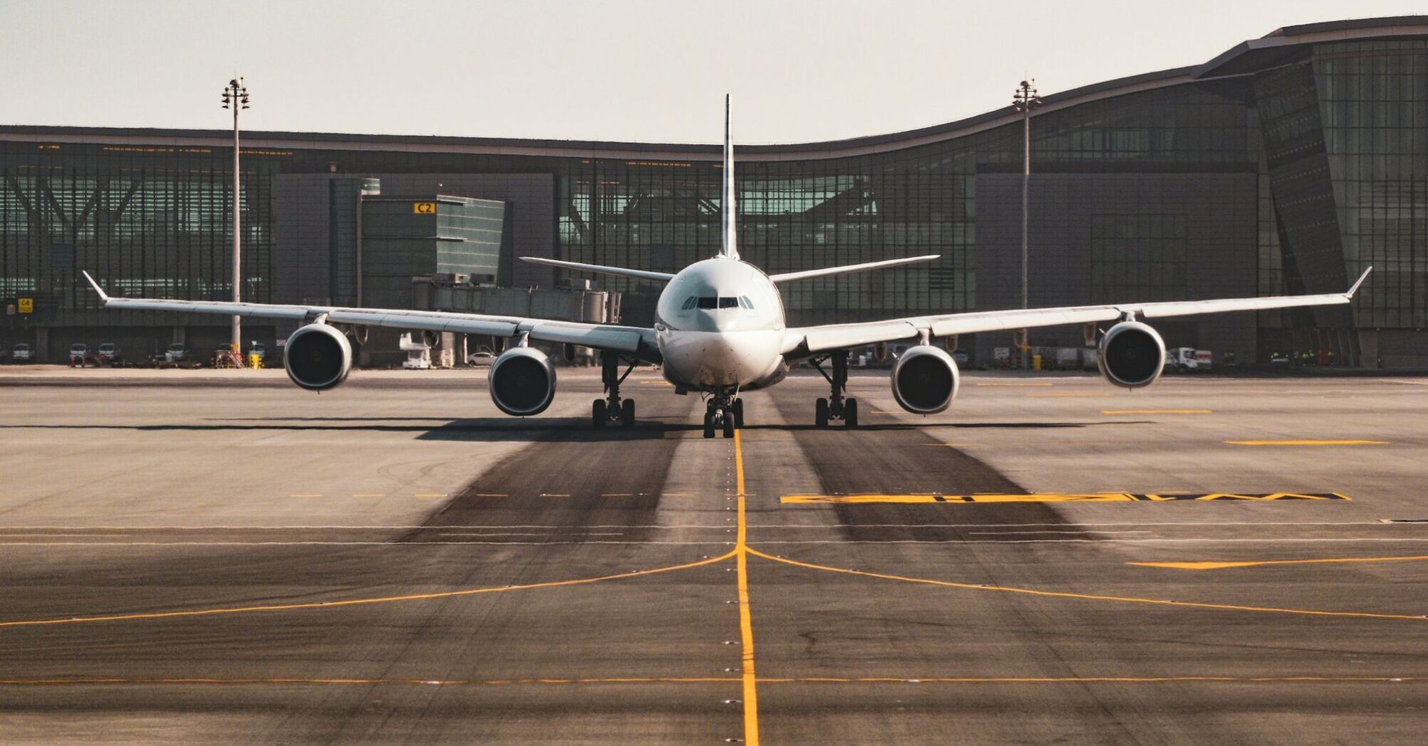 Airplane preparing for departure at a modern UK airport terminal