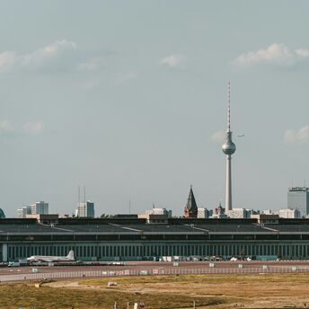 View of Berlin’s TV Tower and Tempelhof area under a clear sky