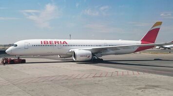 Iberia aircraft on the runway at Madrid Airport before departure
