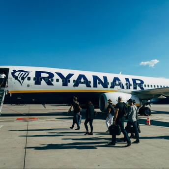 Passengers boarding a Ryanair aircraft at the airport