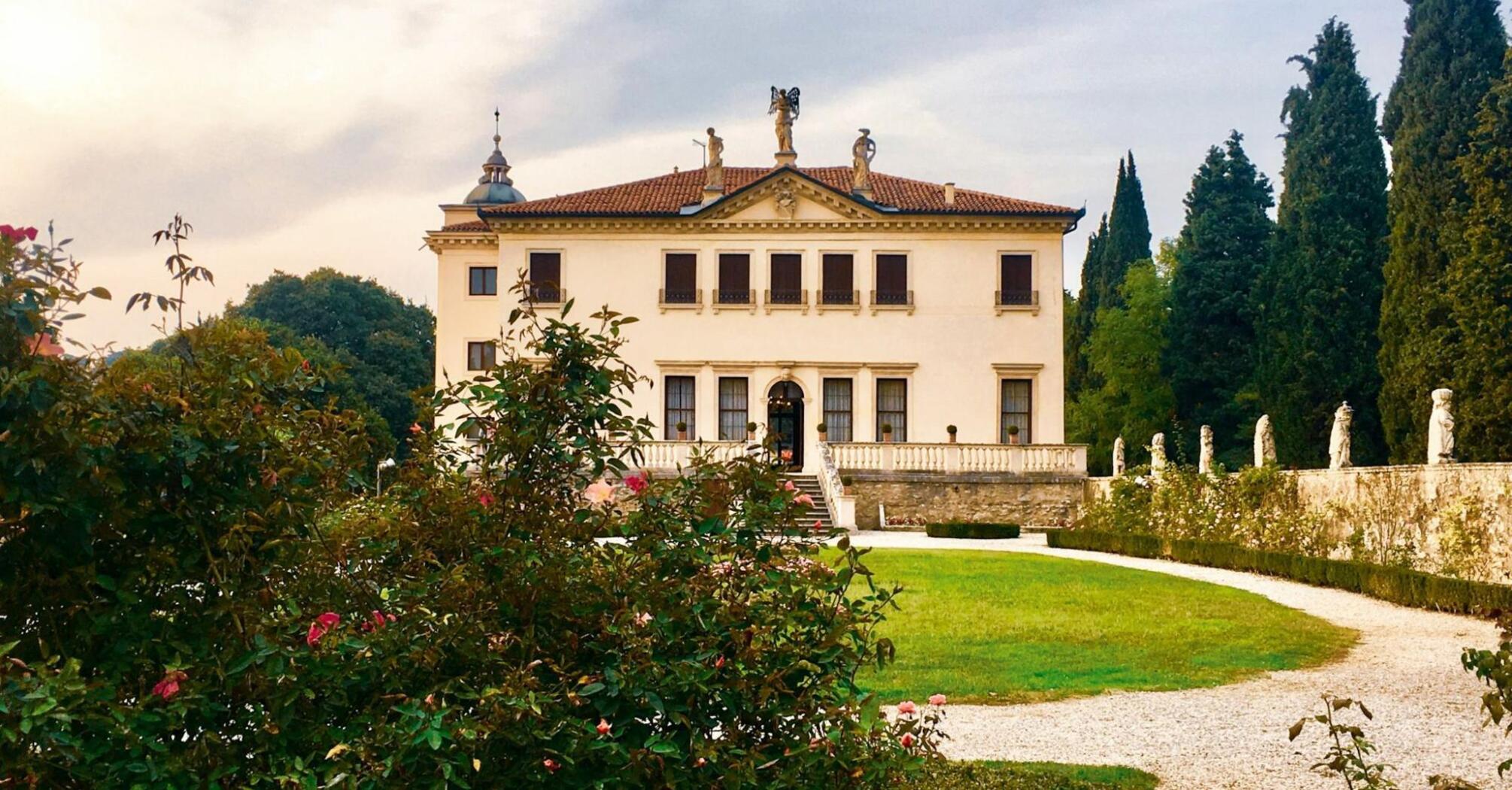 Renaissance-style villa surrounded by gardens and cypress trees in Fiesole near Florence