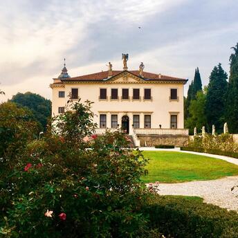 Renaissance-style villa surrounded by gardens and cypress trees in Fiesole near Florence