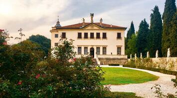 Renaissance-style villa surrounded by gardens and cypress trees in Fiesole near Florence
