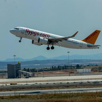Pegasus Airlines Airbus A320 taking off from Izmir Airport on a clear day