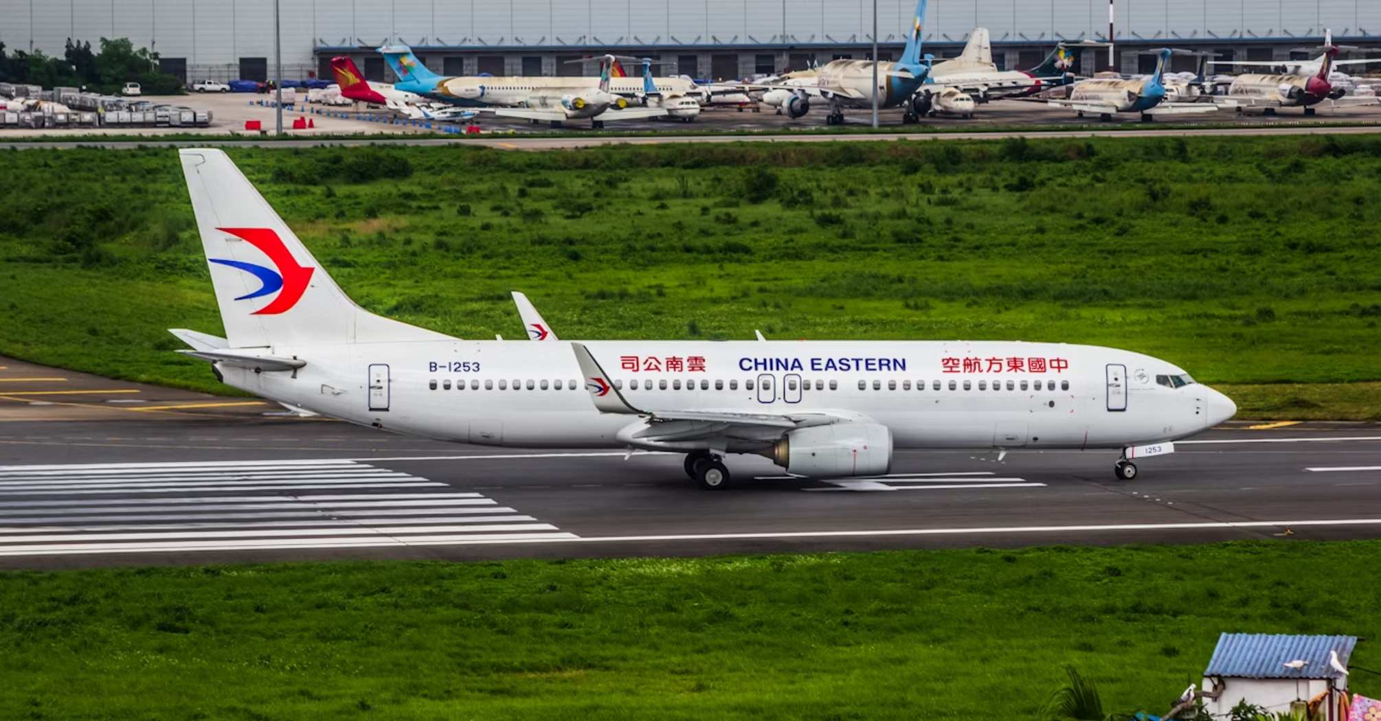 China Eastern airplane taxiing at airport runway