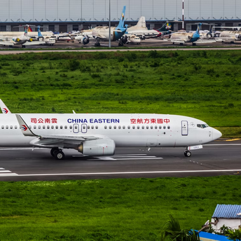 China Eastern airplane taxiing at airport runway