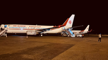 Air Algérie airplanes parked at night on the runway