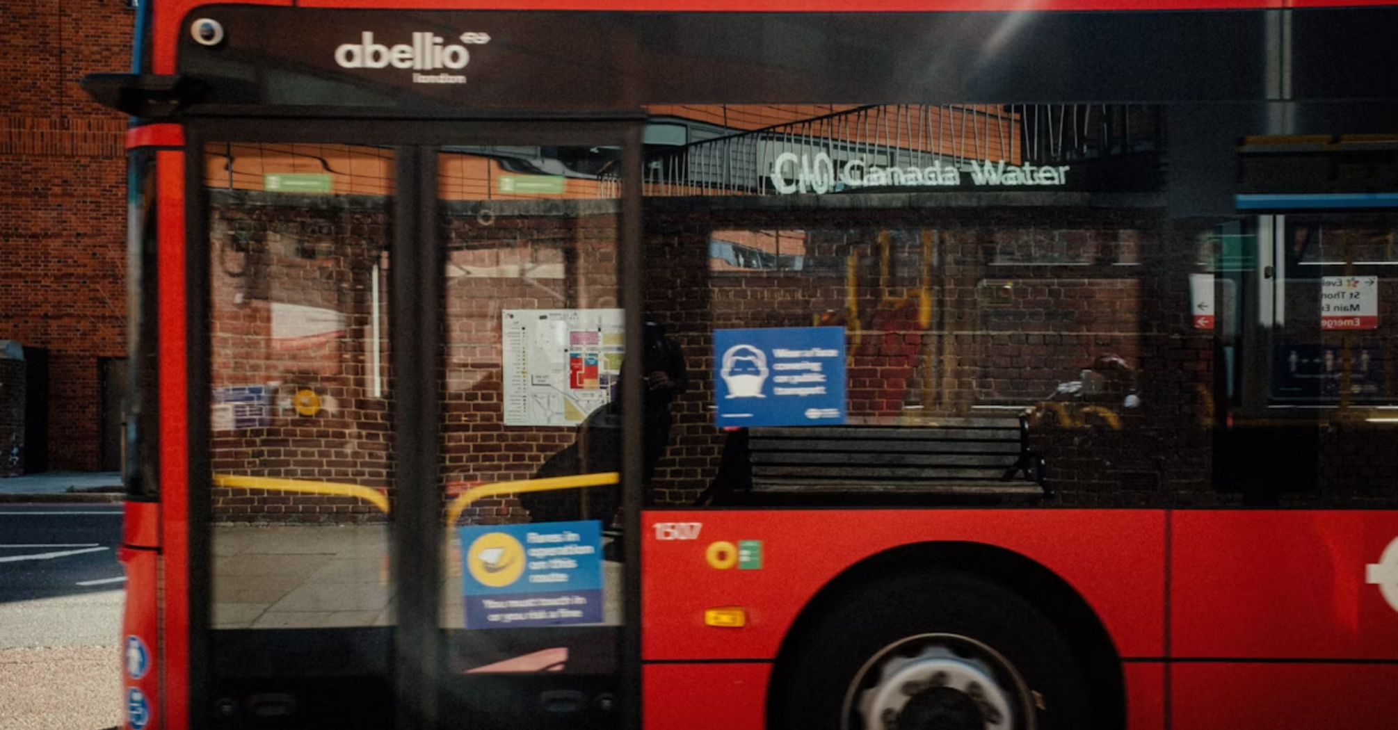 Red London bus on the C10 route near Canada Water