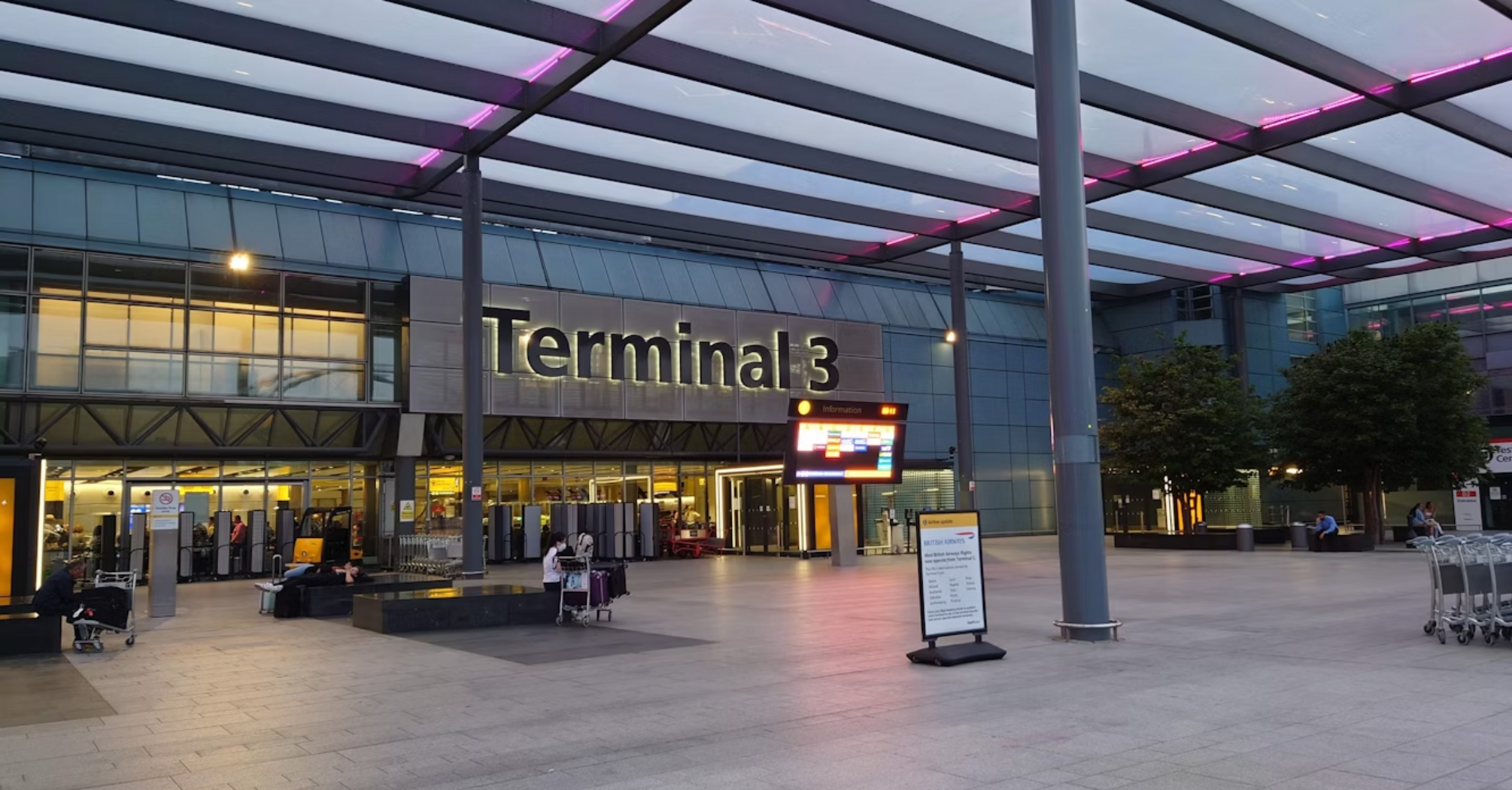 Exterior view of Terminal 3 at London Heathrow Airport in the evening