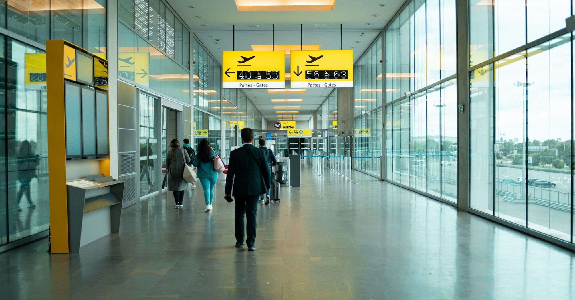 Passengers at Stuttgart Airport Terminal 1 near new Napcabs cabins