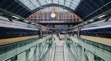 Eurostar trains at St Pancras International station under a glass roof