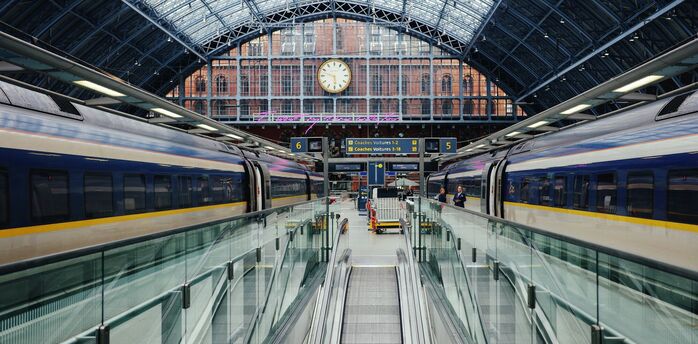 Eurostar trains at St Pancras International station under a glass roof