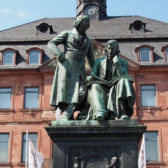 Statue of the Brothers Grimm in a German town square