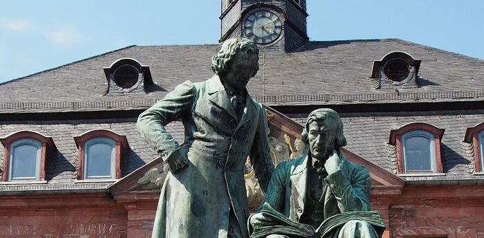 Statue of the Brothers Grimm in a German town square