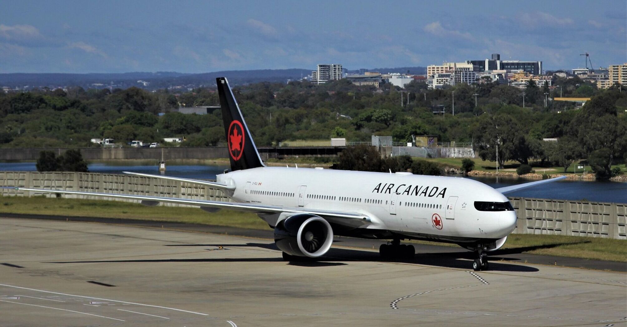 Air Canada aircraft taxiing at the airport before departure