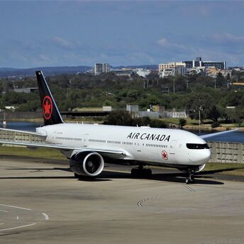 Air Canada aircraft taxiing at the airport before departure