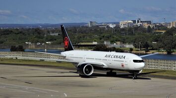 Air Canada aircraft taxiing at the airport before departure