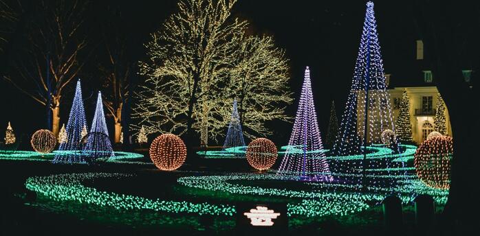 Illuminated trees and glowing light installations at a Christmas trail in North West England