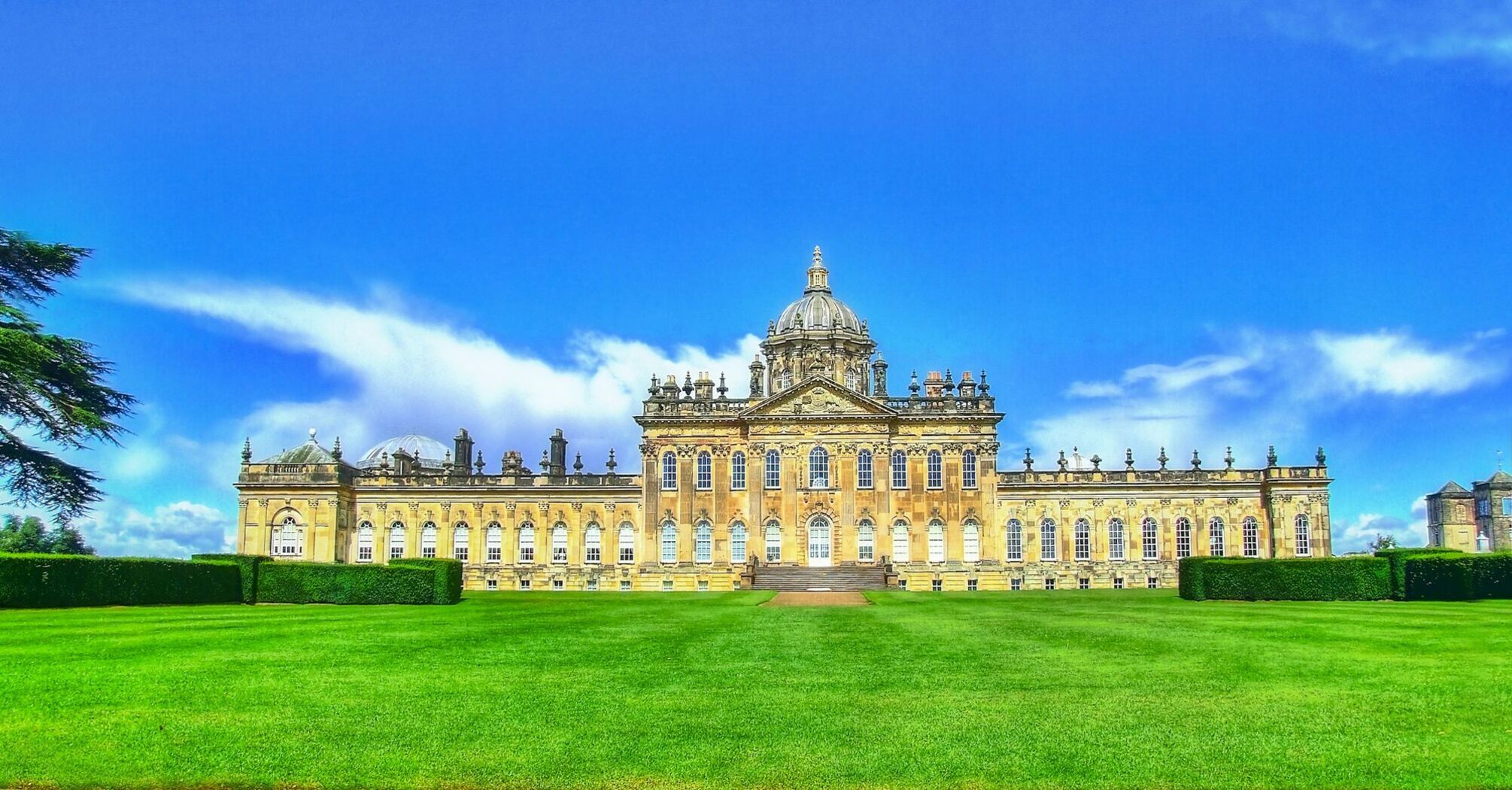 Historic Castle Howard under a clear summer sky
