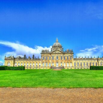 Historic Castle Howard under a clear summer sky