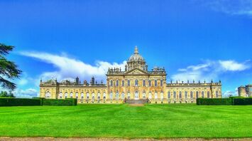 Historic Castle Howard under a clear summer sky