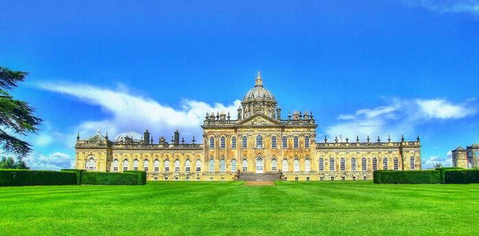 Historic Castle Howard under a clear summer sky