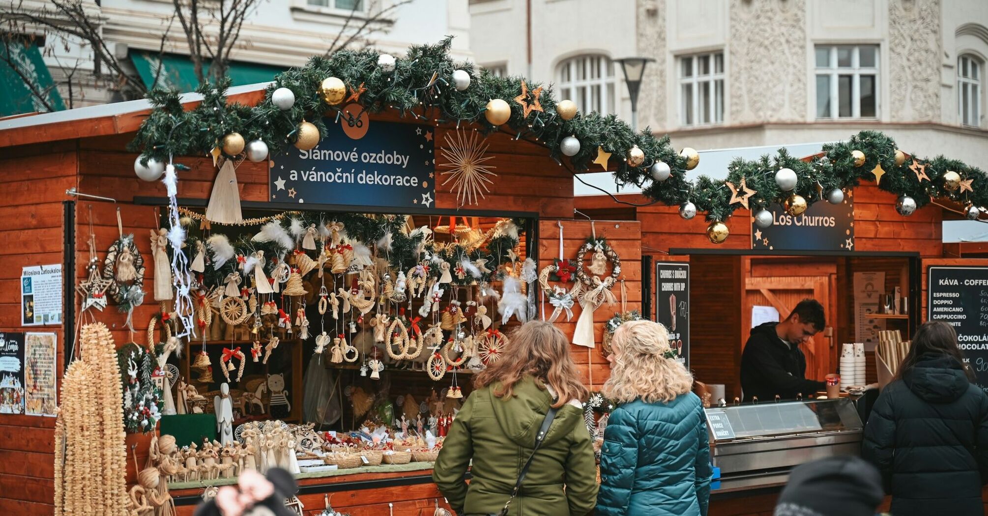 Wooden Christmas market stall selling handmade decorations