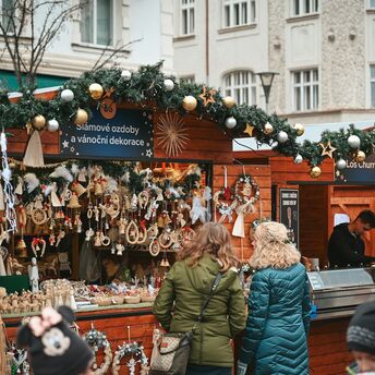 Wooden Christmas market stall selling handmade decorations