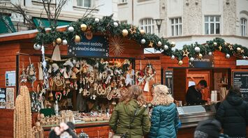 Wooden Christmas market stall selling handmade decorations